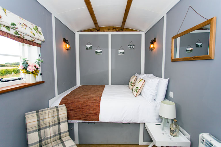 The dove grey interior of Hedge Betty, the closest hut to the dayroom/kitchen/WC facility