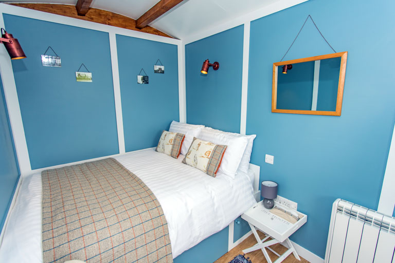 Close-up photo of the cosy double-bed in Jill Hoot