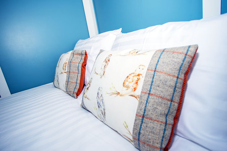Photo of some of the lovely bedding provided by Harriet Wright Interiors
