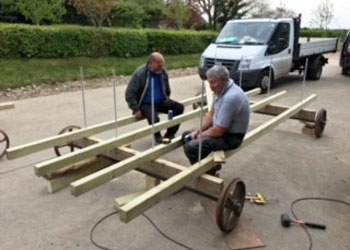 Family friends and local craftsmen, Brian and Bill, help with the construction of the first shepherd hut